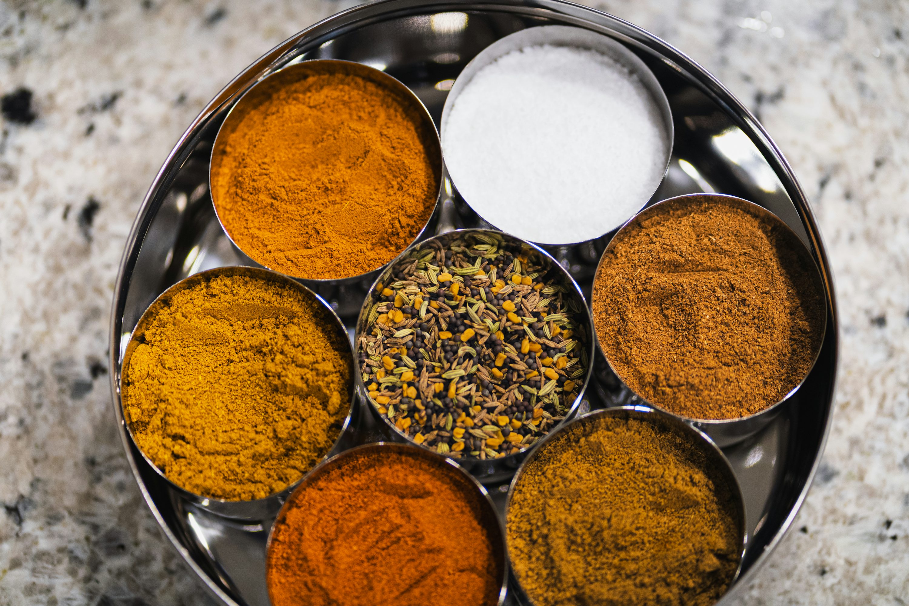 Hill spices — turmeric, pepper, cardamom and clove
